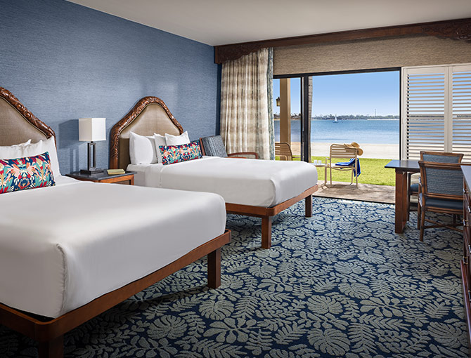 View of Mission Bay from the bayfront room featuring 2 queen beds at the Catamaran Resort Hotel and Spa in the San Diego beaches area.