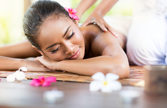 Female client receiving a massage at The Catamaran Spa located by the San Diego beaches