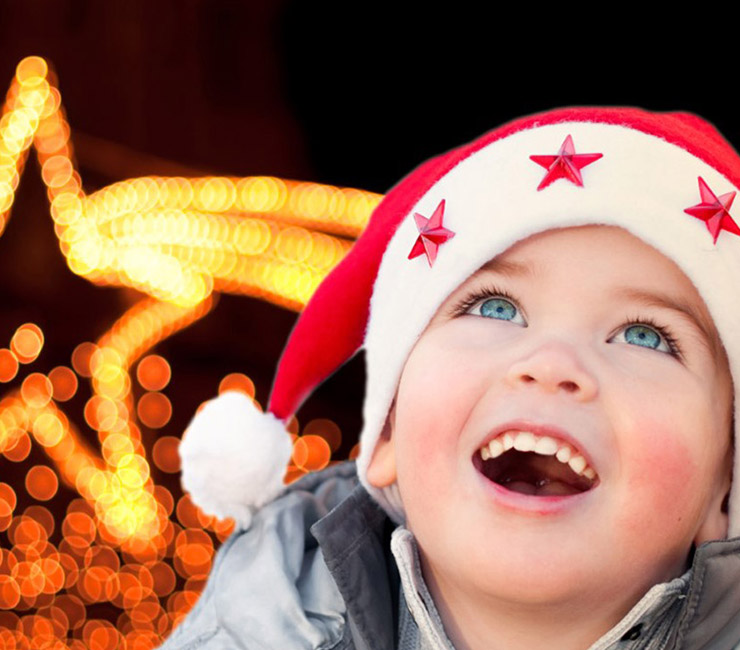 Child watching the Mission Bay Parade of Lights from the Catamaran Resort Hotel in San Diego
